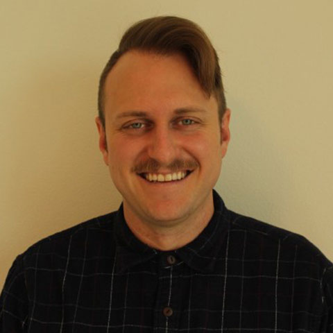 Headshot of Ross Kenyon